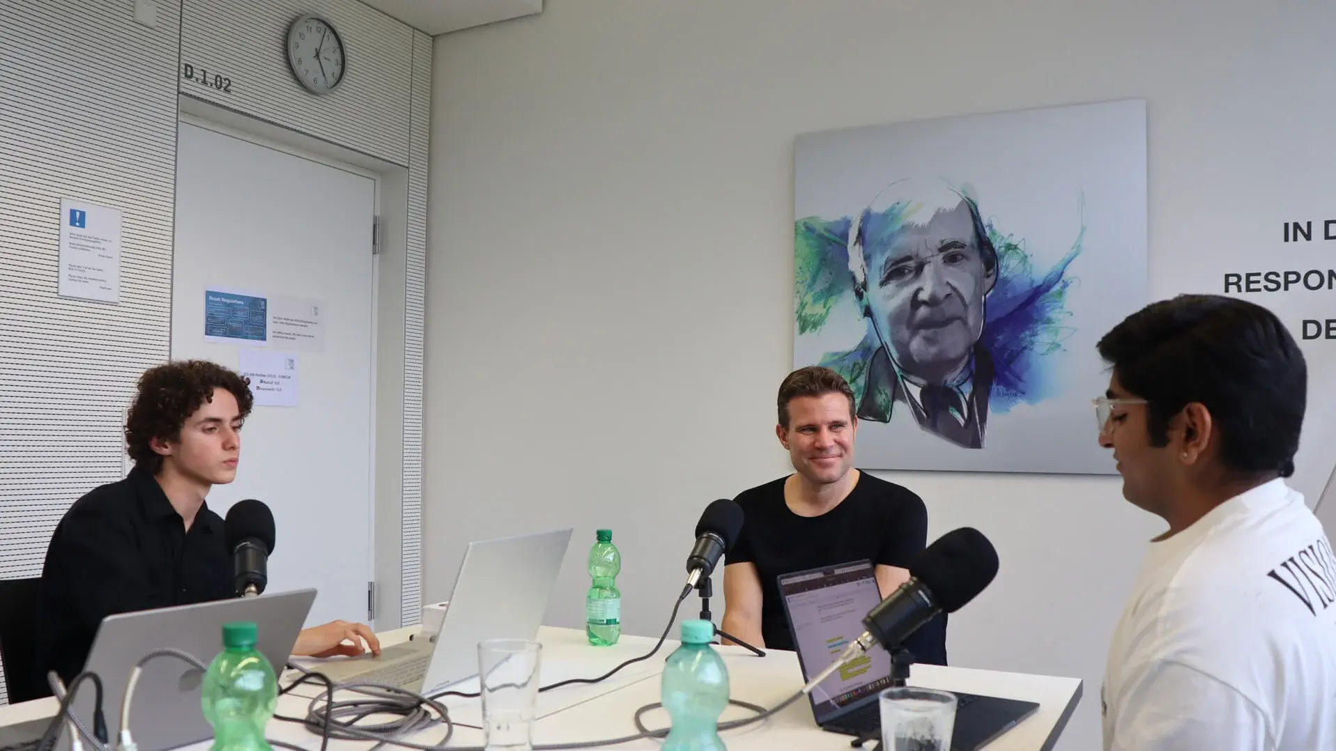 Dr. Felix Brych giving an interview to two students in a podcast at TUM Campus Heilbronn