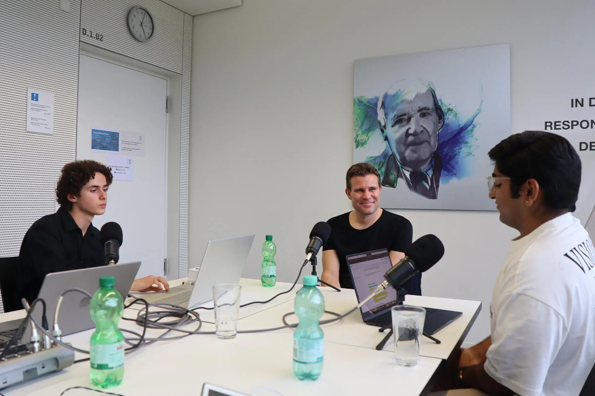 Dr. Felix Brych giving an interview to two students in a podcast at TUM Campus Heilbronn