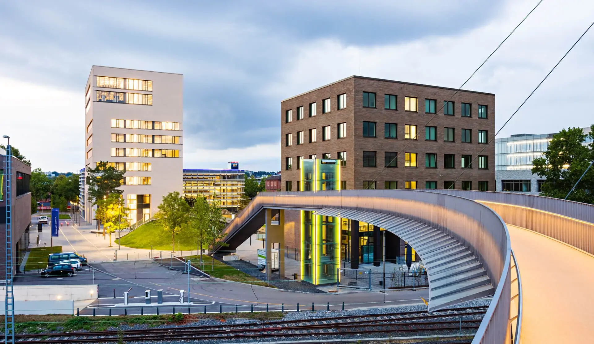 View of TUM Campus Heilbronn from the bridge at sunset
