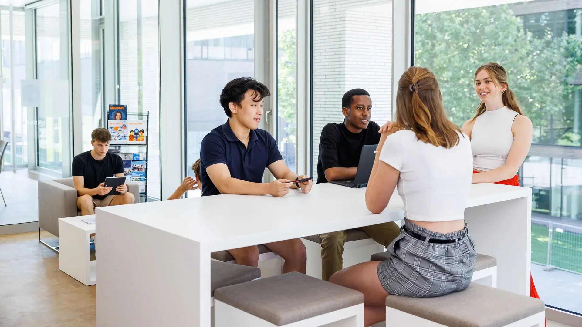 Diverse group of students at a table