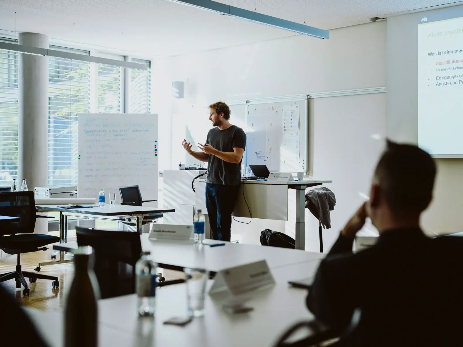 Man presenting in a class room