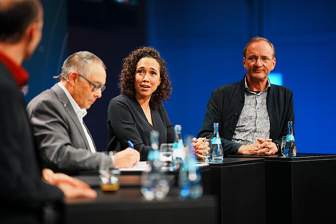 Prof. Dr. Daniel Cremers, Prof. Dr. Dr. Helmut Krcmar, Nicole Büttner & Dr. Gerald Karch on stage at TUM Talk 2024