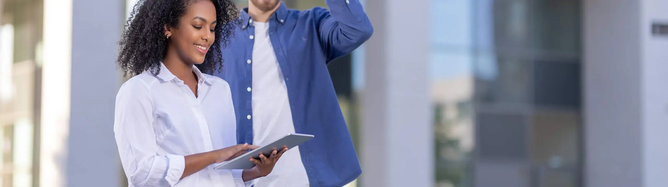 Business professional presenting data to a colleague