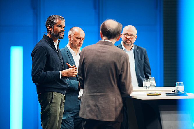 Dr. Uwe Jean Heuser, Florian Bankoley, Dr. Martin May & Dr. Thomas Schneider on stage at Rethink.Mittelstand