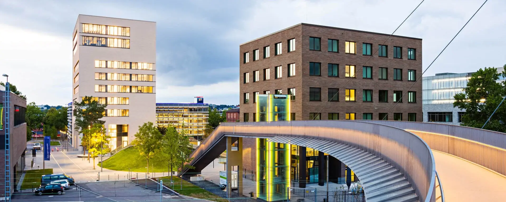 View of TUM Campus Heilbronn from the bridge at sunset