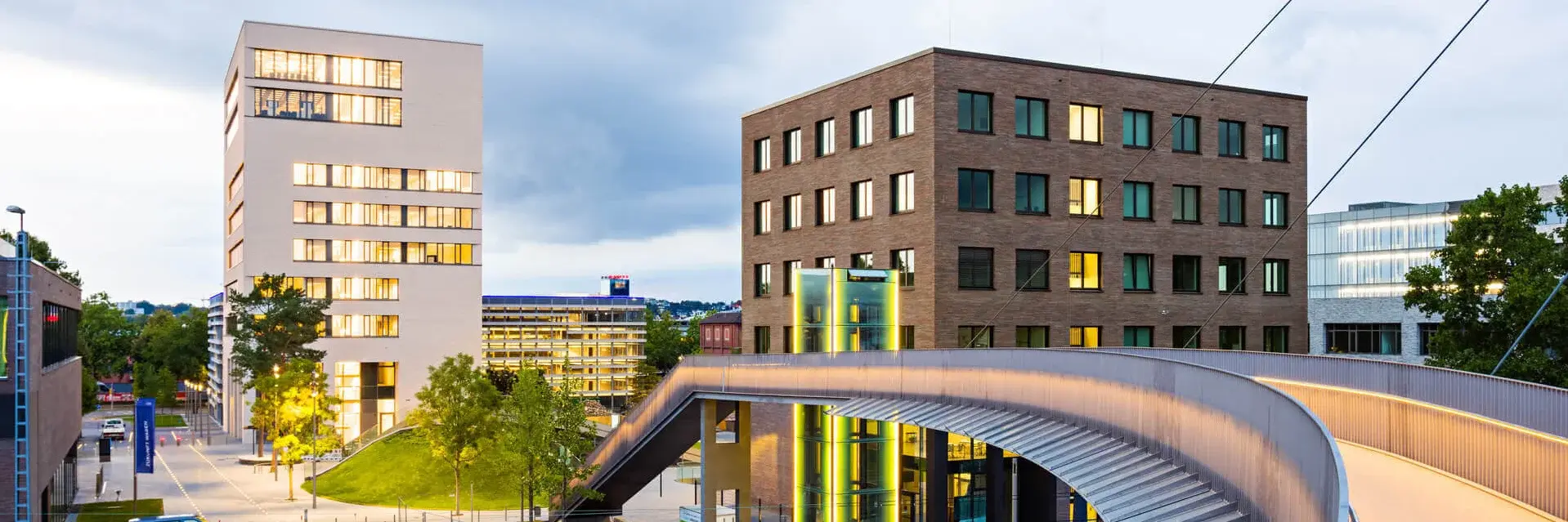 View of TUM Campus Heilbronn from the bridge at sunset