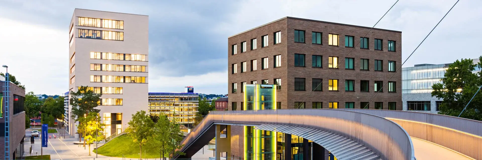 View of TUM Campus Heilbronn from the bridge at sunset