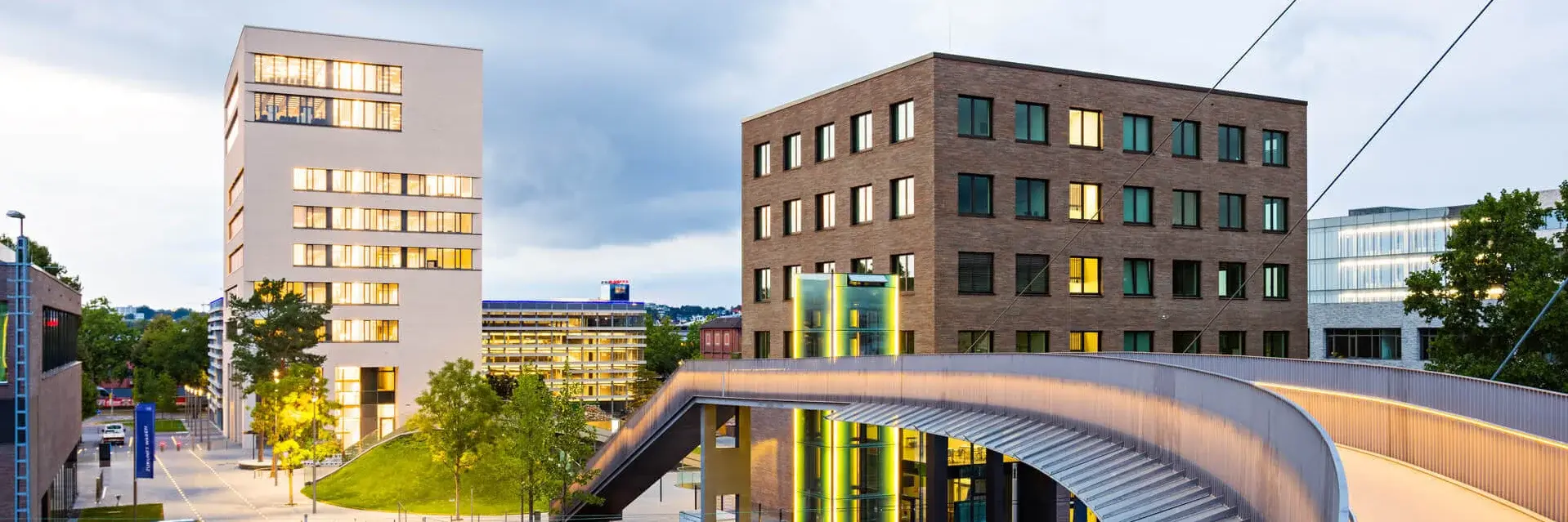 View of TUM Campus Heilbronn from the bridge at sunset