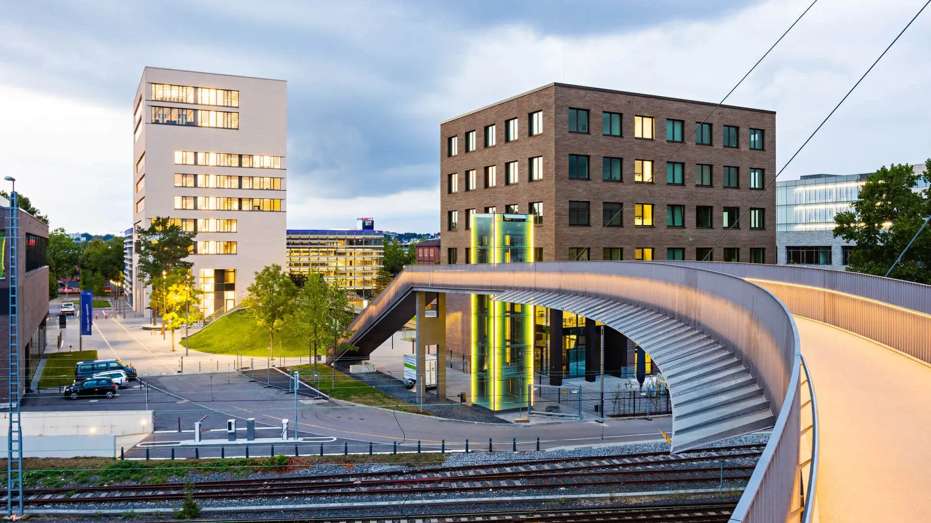 View of TUM Campus Heilbronn from the bridge at sunset