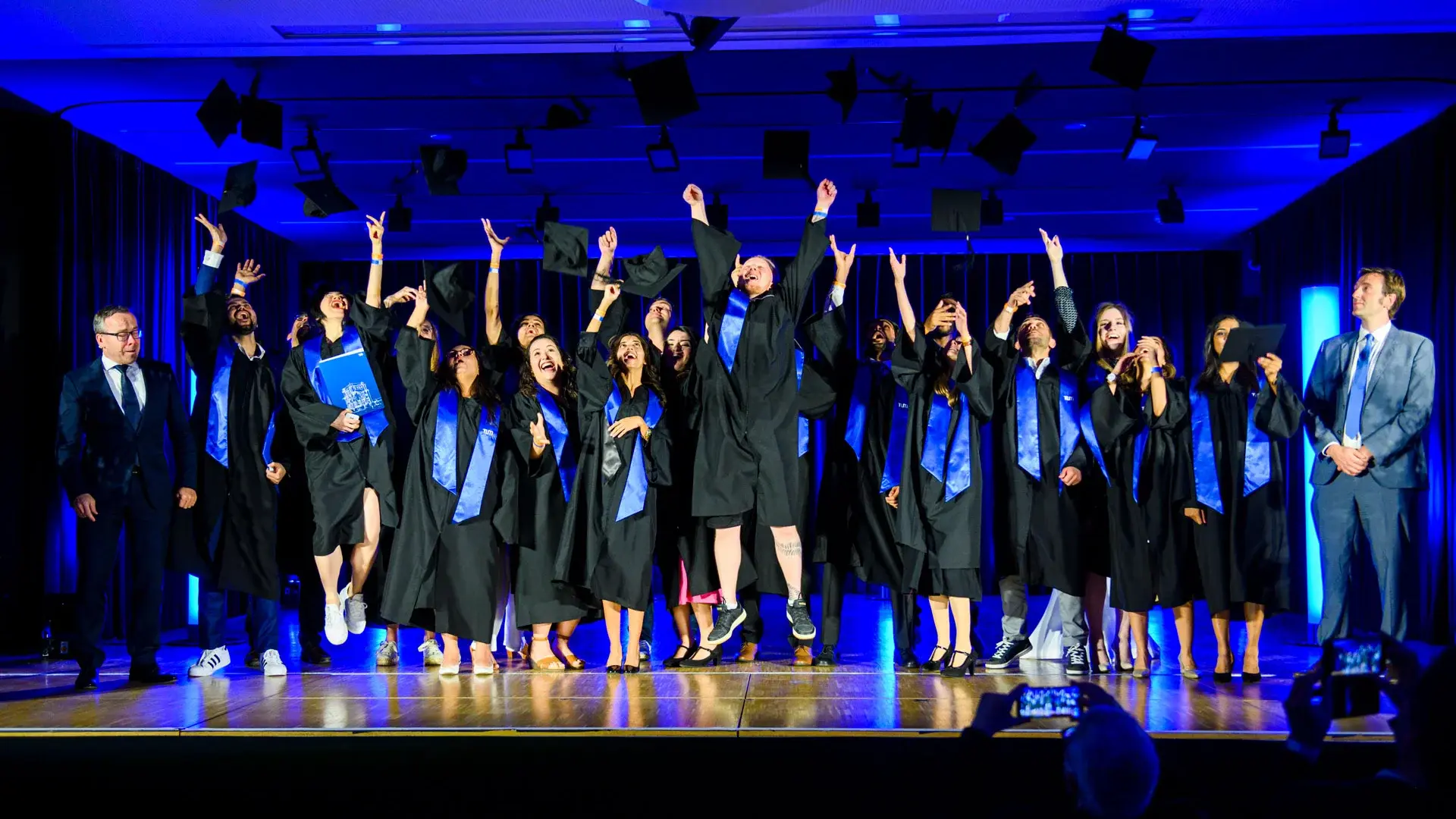 Graduates celebrating at event